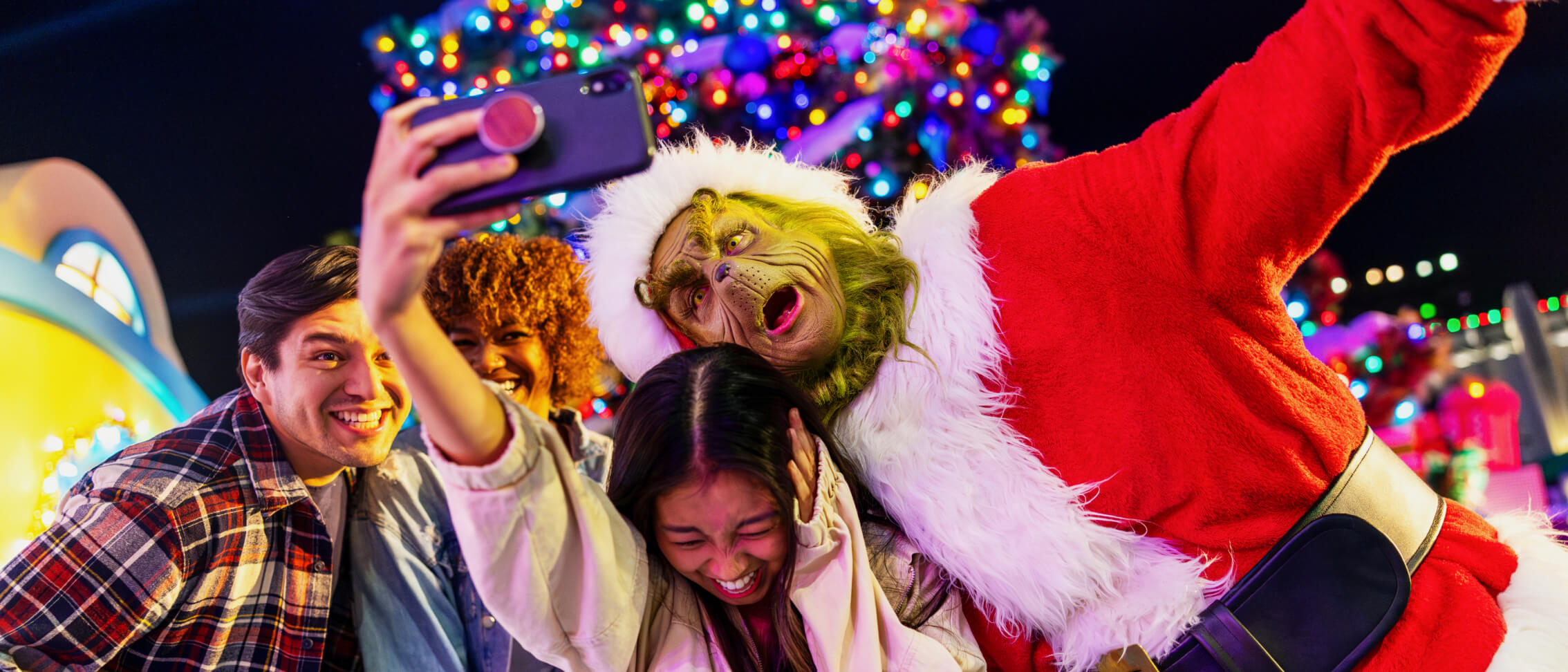 The Grinch and Cindy Lou Who greet guests at Grinchmas, Universal Studios Hollywood