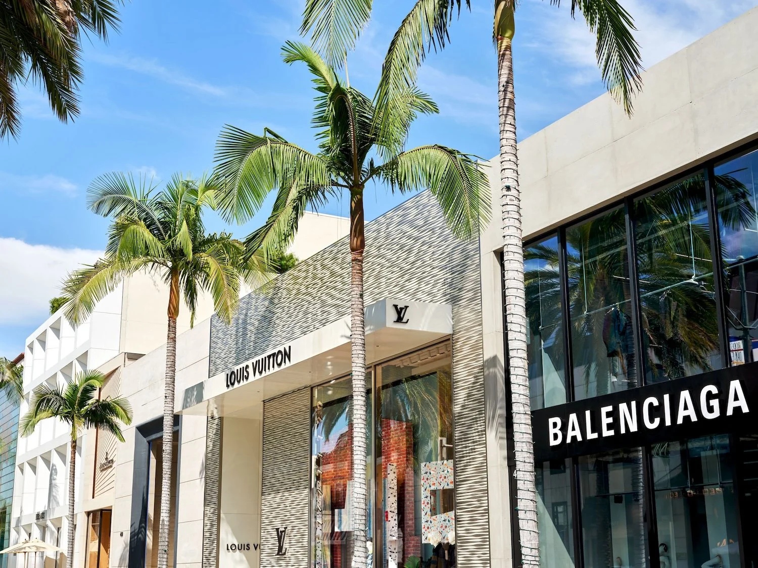 Palm-lined storefronts and boutiques along Rodeo Drive in Beverly Hills