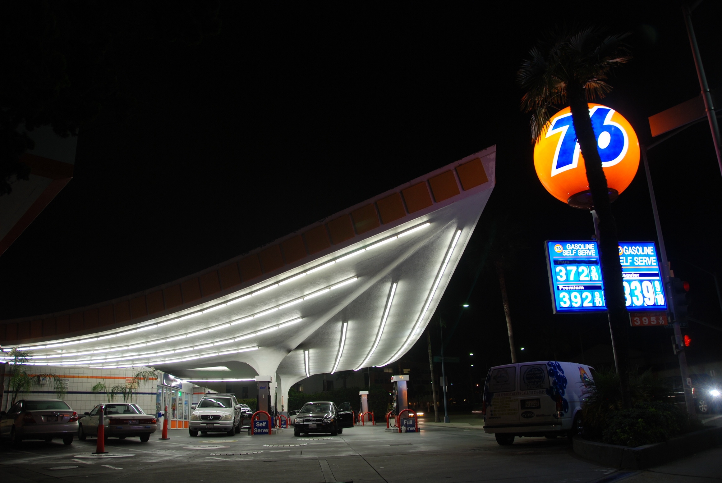 The space-age Union 76 gas station canopy in Beverly Hills, lit up at night