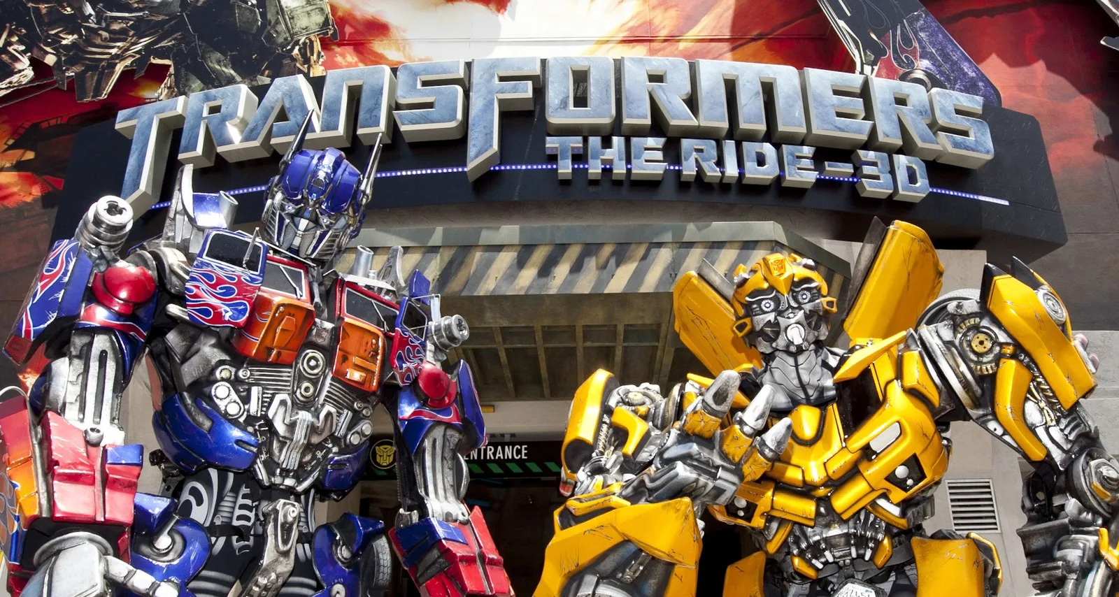 Optimus Prime and Bumblebee outside TRANSFORMERS: The Ride-3D at Universal Studios Hollywood