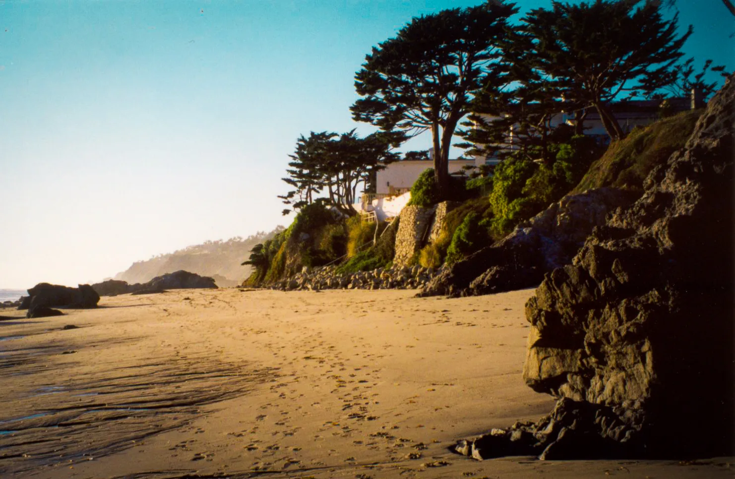A secluded golden-hour cove at Lechuza Beach, Malibu
