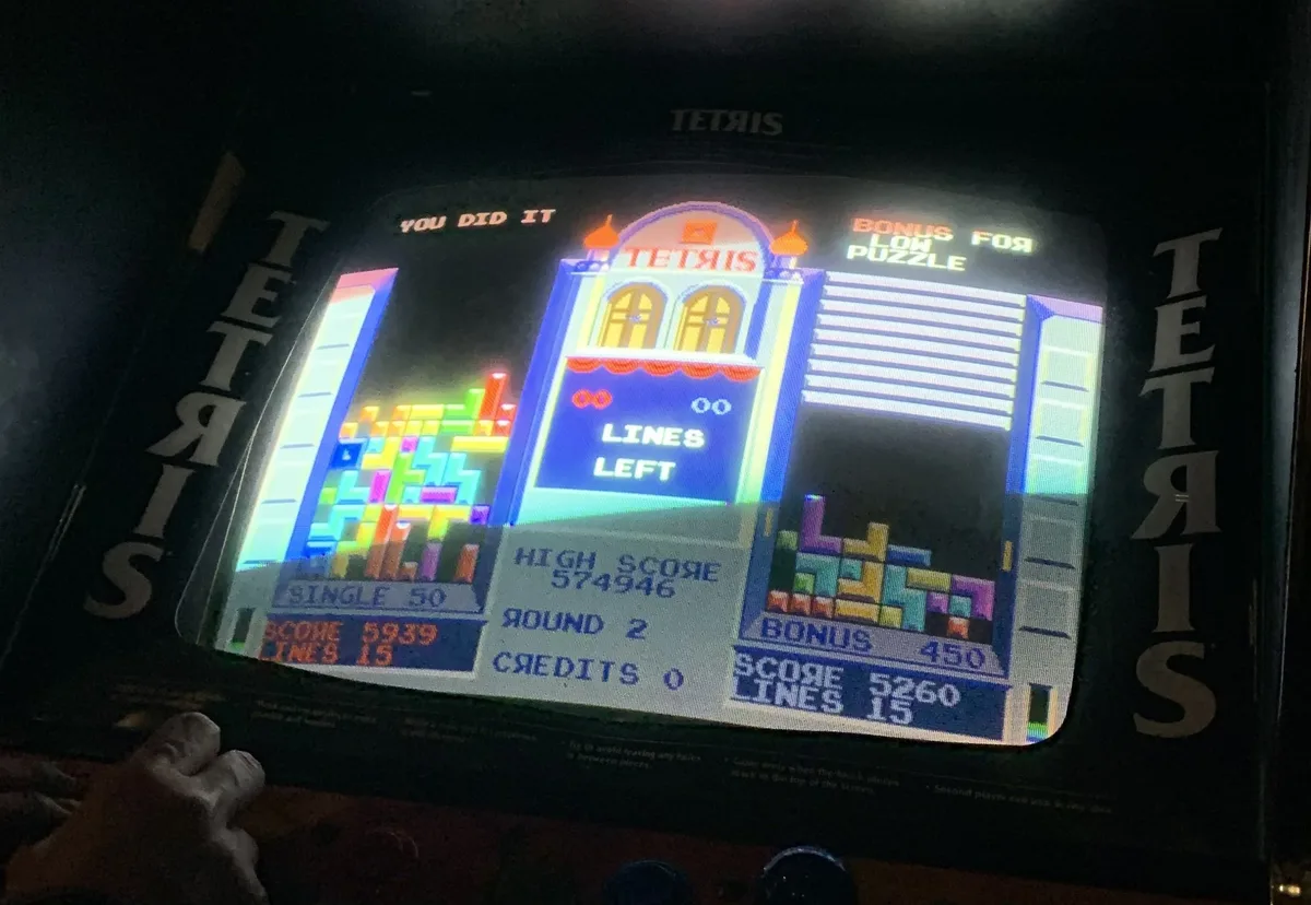 Classic arcade cabinets inside The Paradox Arcade + Bar in Pomona