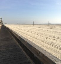 The long sweep of Peninsula Beach toward the bridge, Long Beach