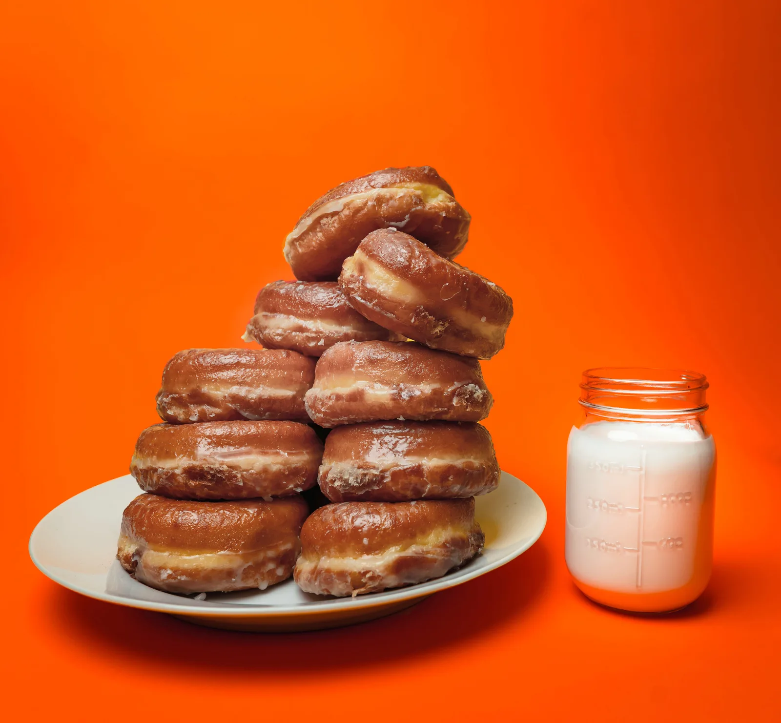 A towering stack of glazed donuts from Randy's Donuts, the iconic LA landmark.