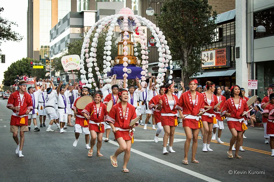 The Nisei Week Grand Parade moving through Little Tokyo. Photo credit Kevin Kuromi