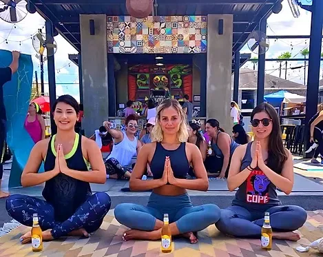 Outdoor yoga class at the Loews Hollywood Hotel with Ella Yoga Studio