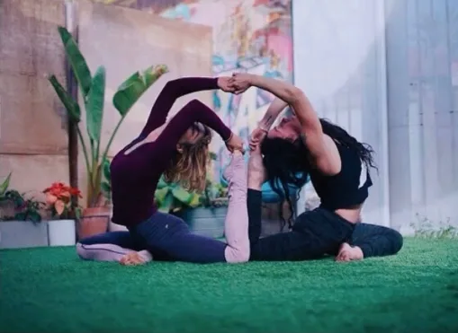 Outdoor garden yoga class at Light on Lotus Yoga on Venice Blvd