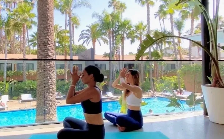 Sunset rooftop yoga class at the Hollywood Roosevelt pool deck