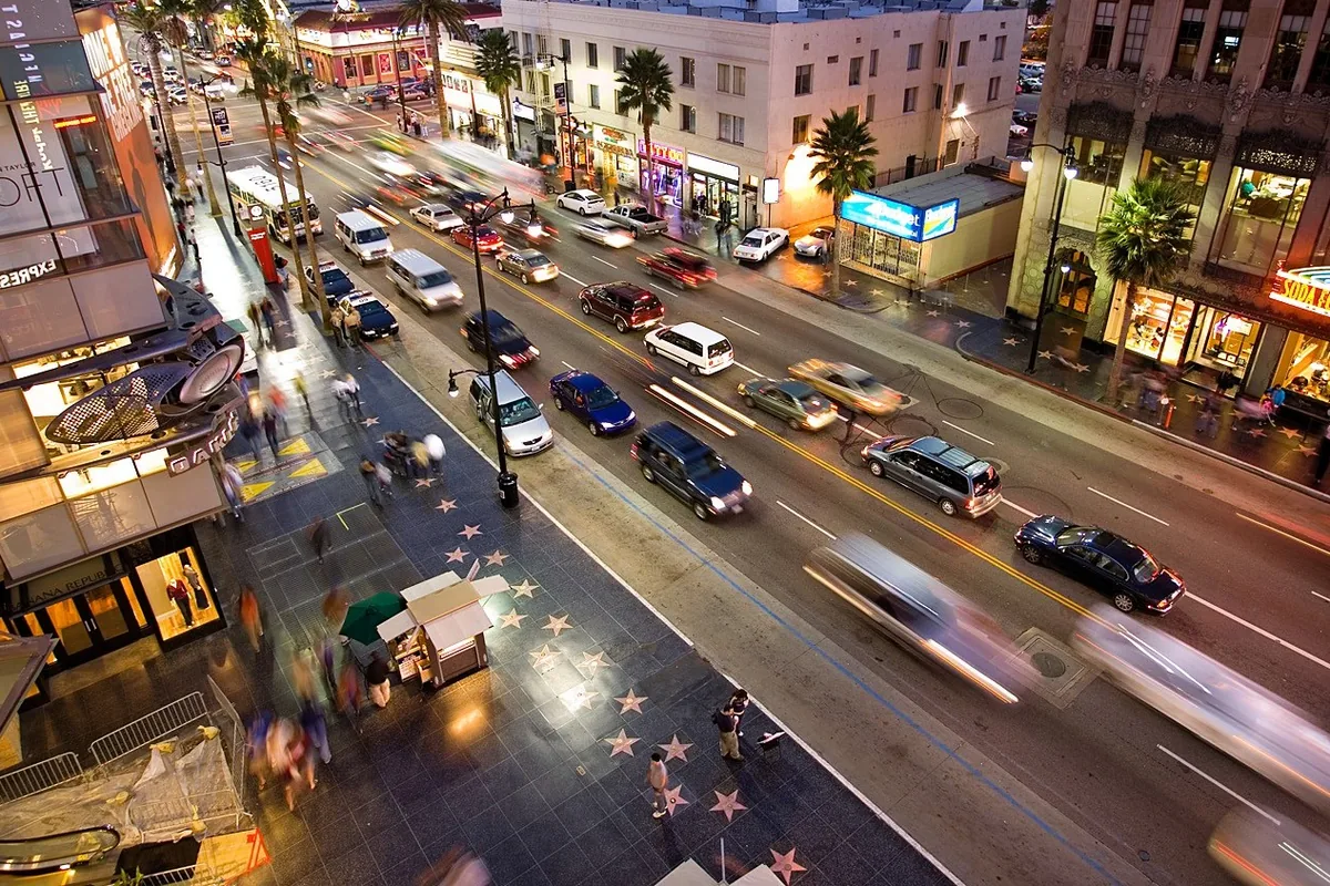 Hollywood Blvd and the Walk of Fame stars at dusk