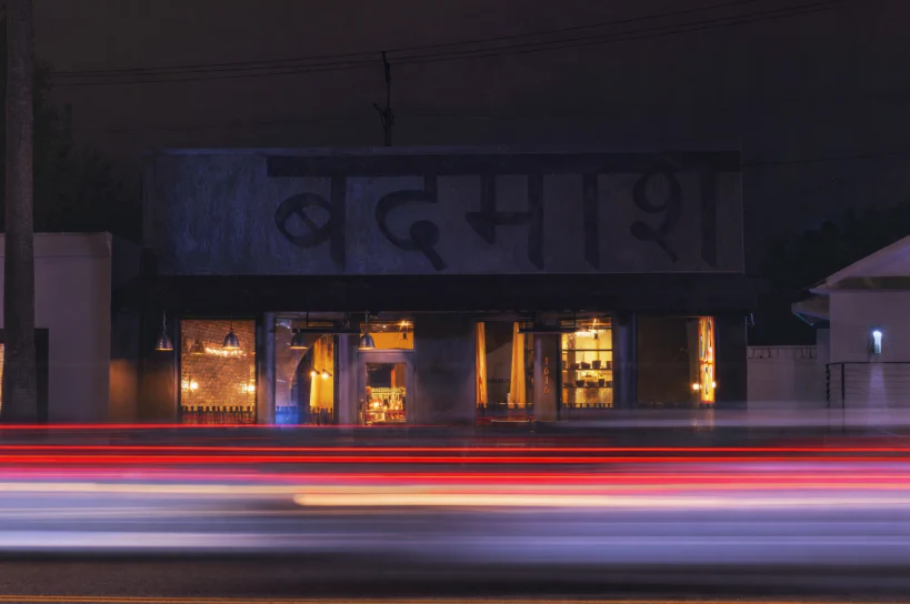 The dining room and food spread at Badmaash, the Indian gastropub in Downtown Los Angeles.