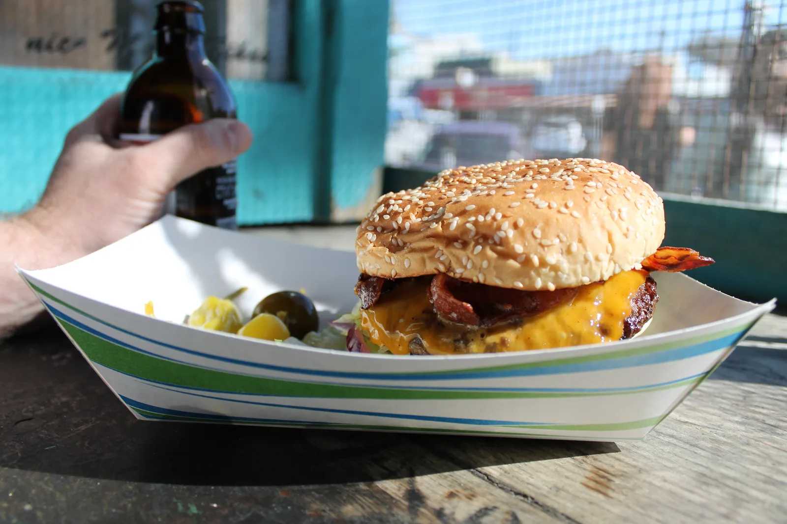 The famous cheeseburger and a cold beer at Hinano Cafe, steps from the Venice Beach pier.