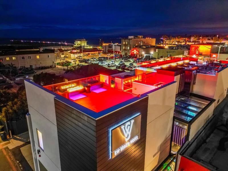 The red-lit rooftop bar at the SW Beach Hotel at dusk