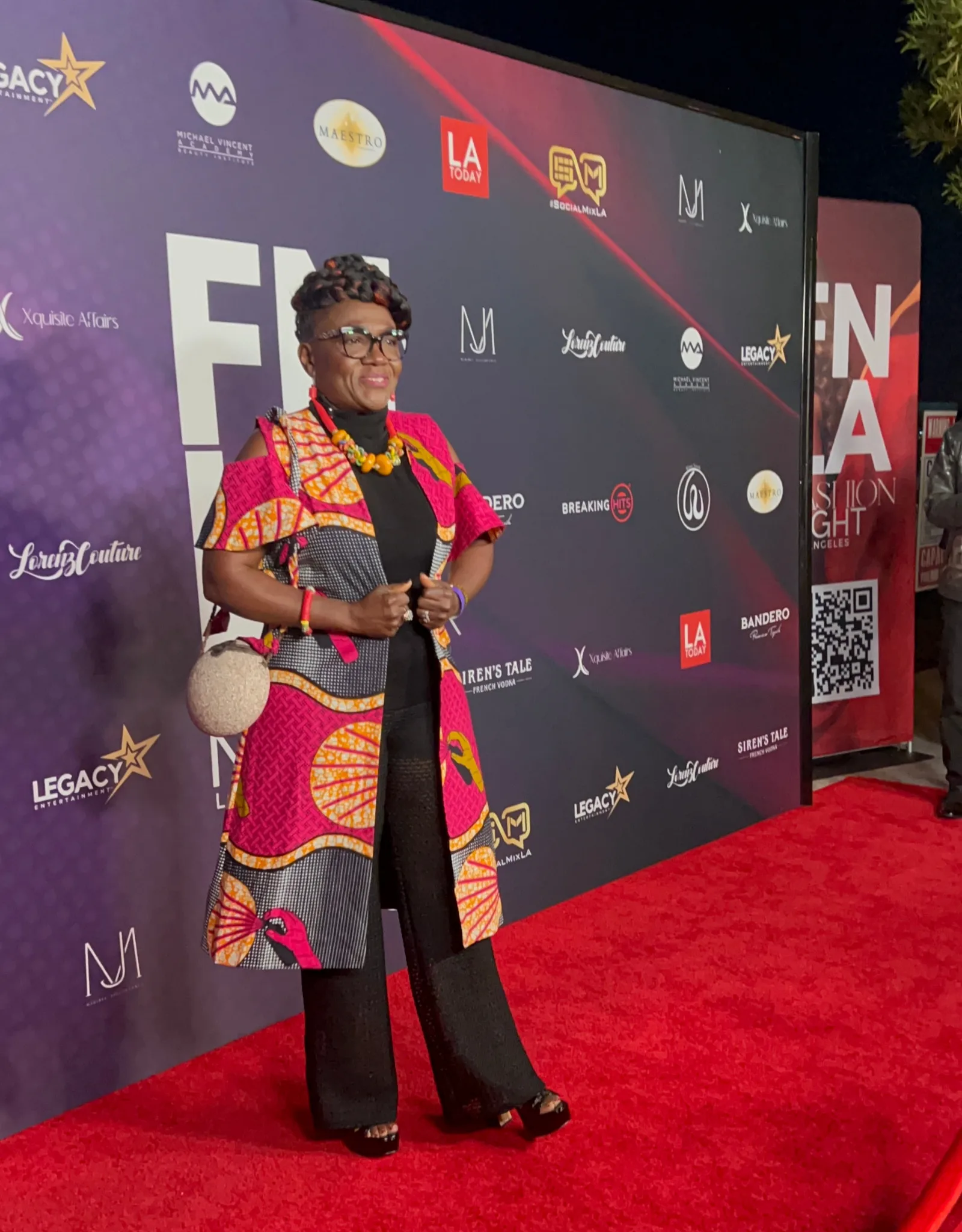Dr. Judith Foyabo on the red carpet during the final LA Fashion Week spring show of 2024.