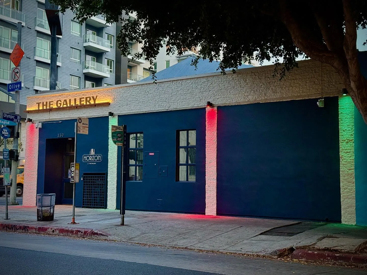 Blue single storey storefront on a quiet residential street