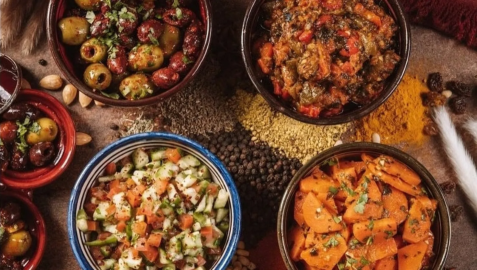 A spread of Moroccan dishes on display at Kasbah by Members
