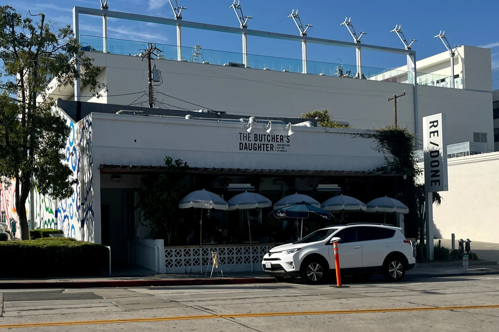 The colorful storefronts and murals of the Melrose Avenue shopping district in Los Angeles.