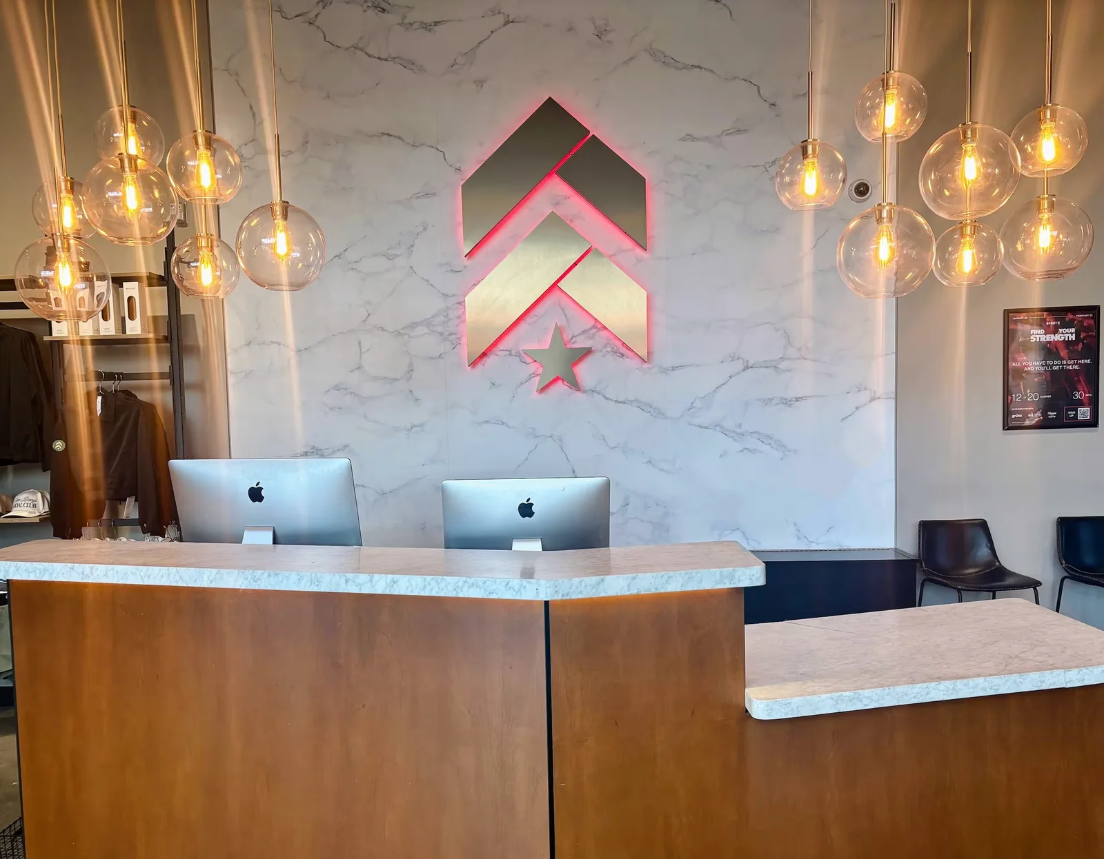 Smoothie bar counter with neon signage and stools