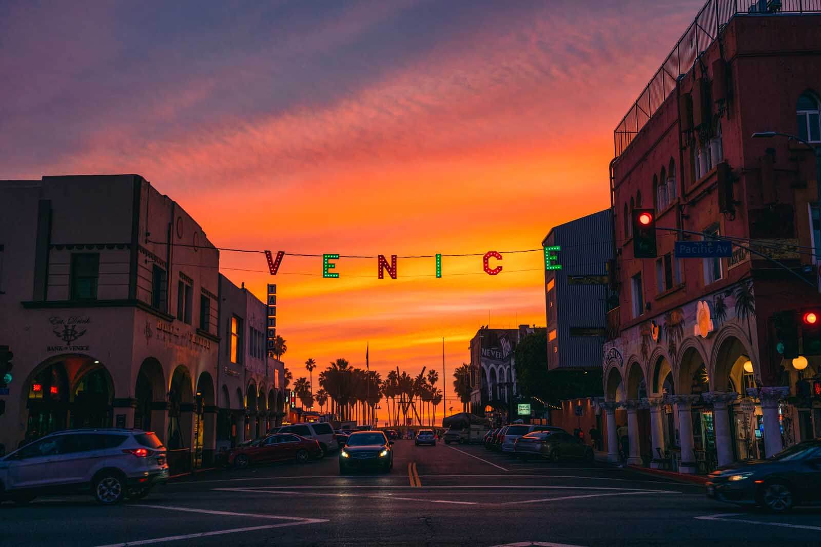 Venice sign over the boardwalk at sunset