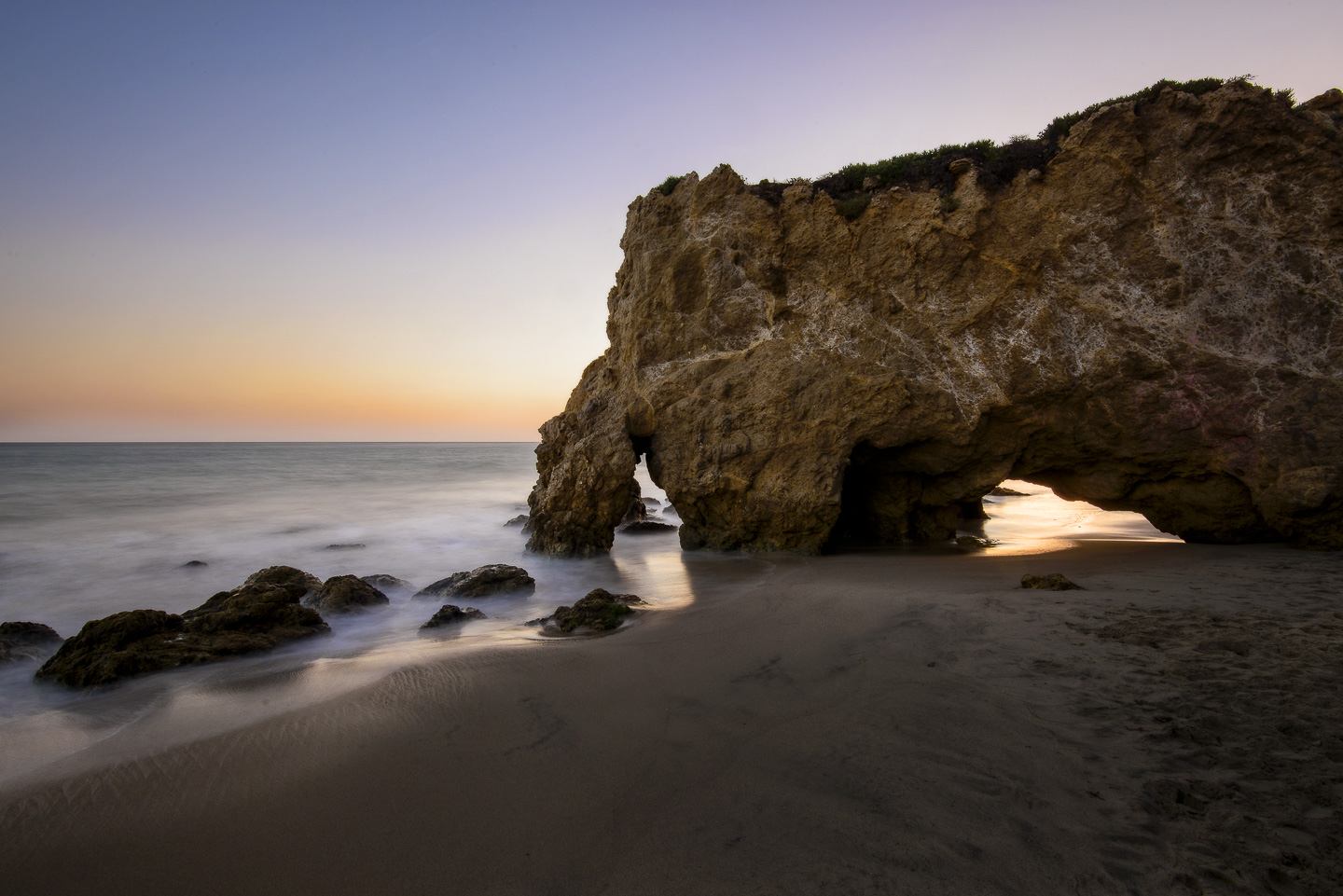 Sea arch at El Matador State Beach, Malibu, at sunset