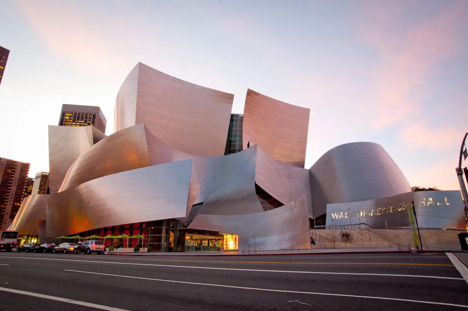 The full stainless steel exterior of Walt Disney Concert Hall at dusk