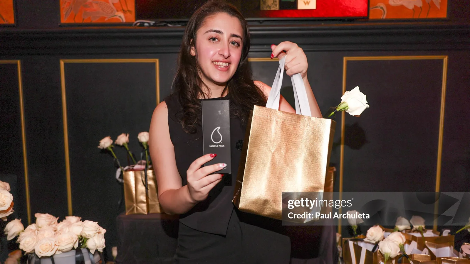 Gold Gift Bags with Sweet Sweat premium swag.
