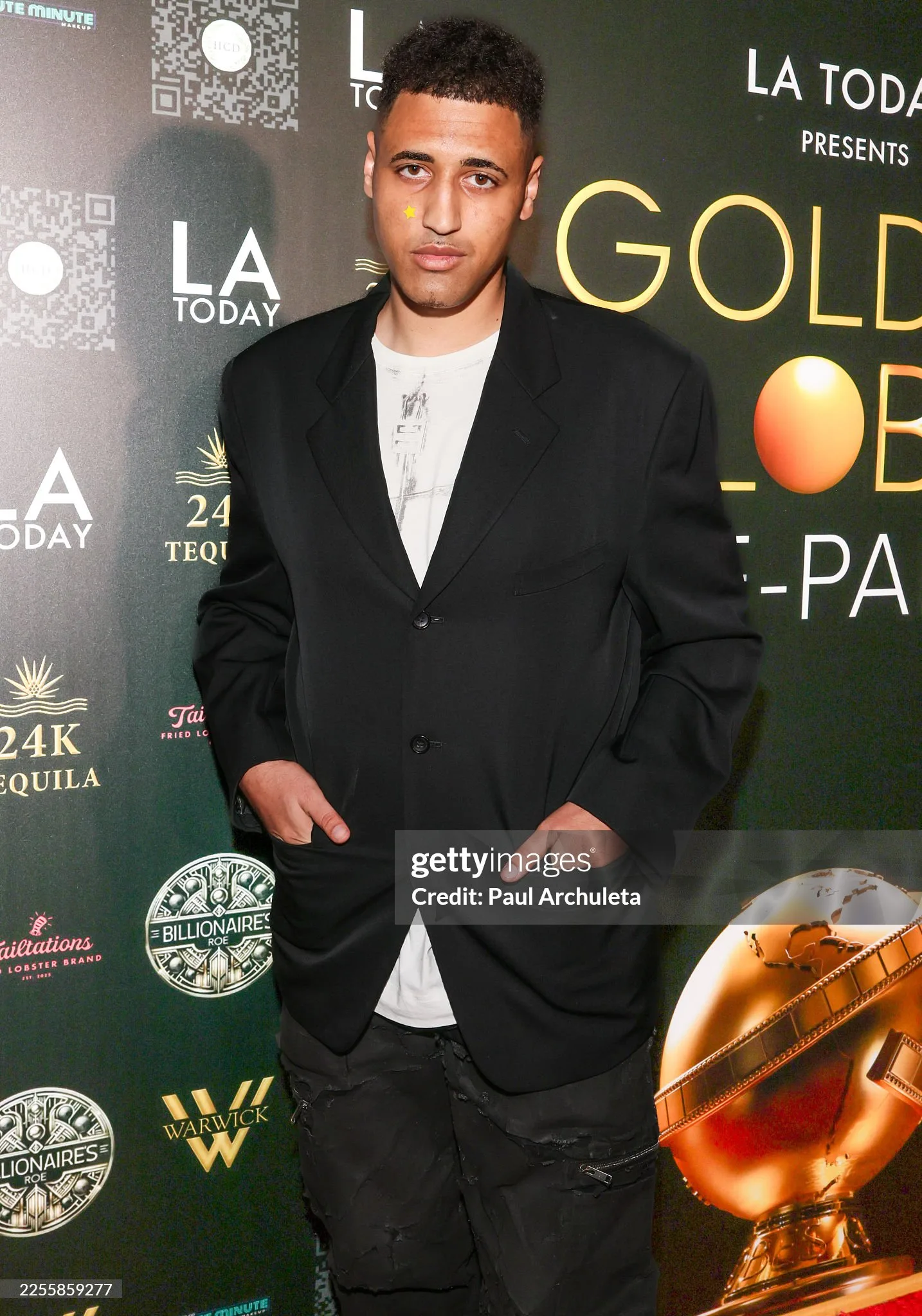 CJ Stowklyn on the Golden Globes Pre-Party red carpet at LA Today's VIP event.