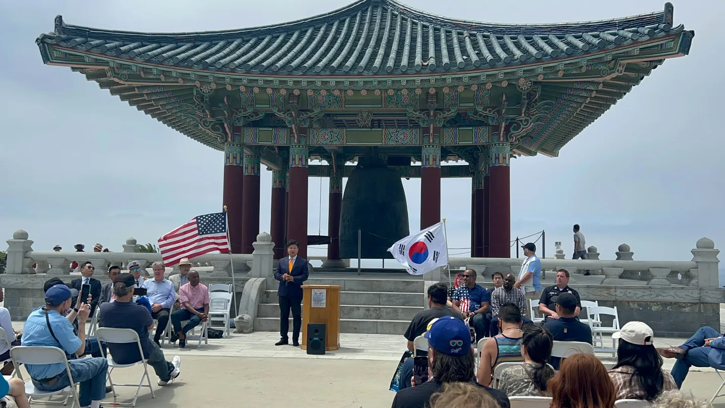 The bronze Korean Friendship Bell inside its stone pavilion at Angels Gate Park in San Pedro, Los Angeles.