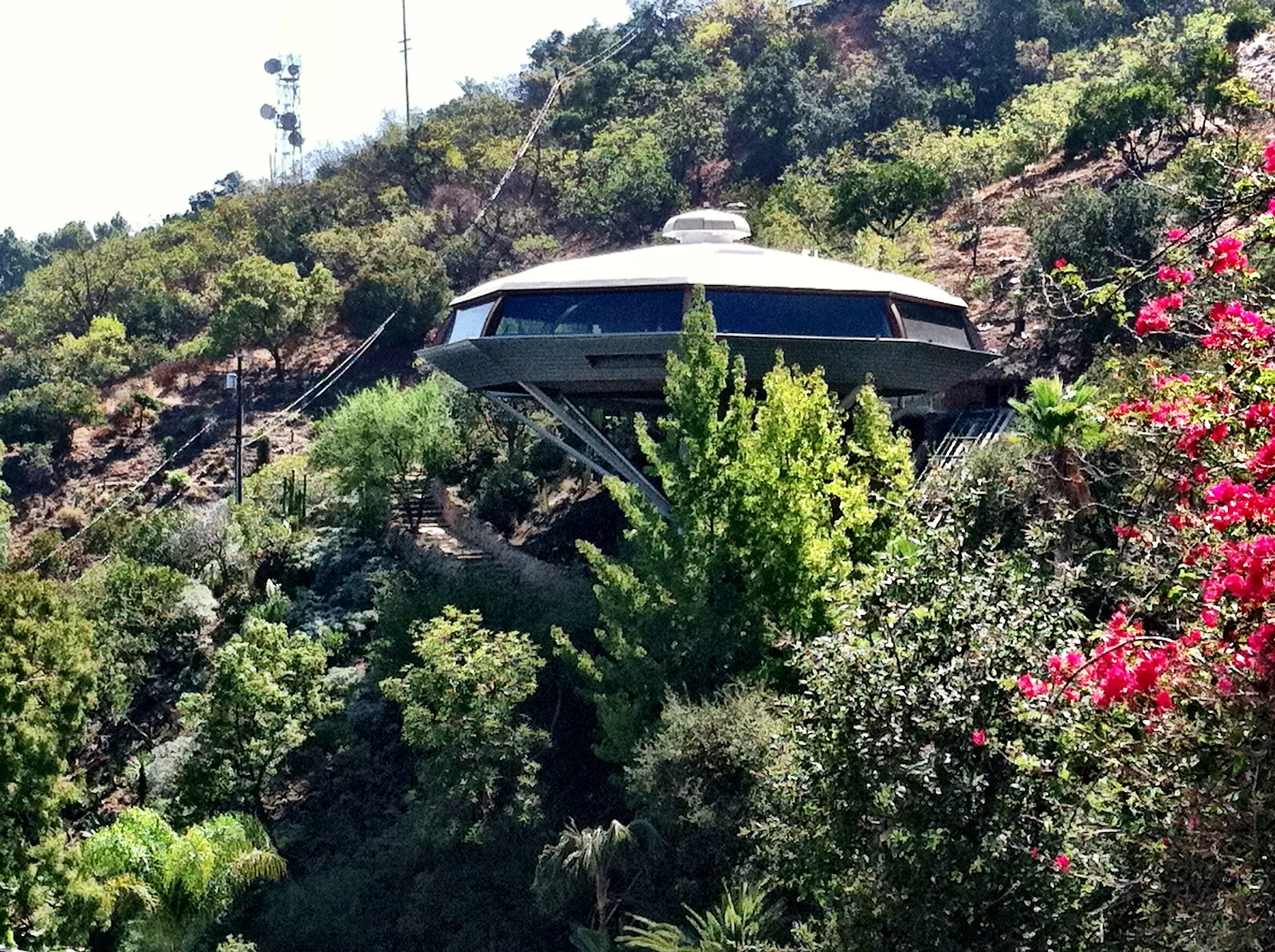 The octagonal Chemosphere house perched on its single concrete column in the Hollywood Hills above Los Angeles.