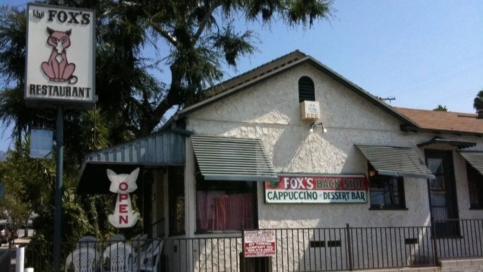 Fox's Restaurant from the outside. White building with signs