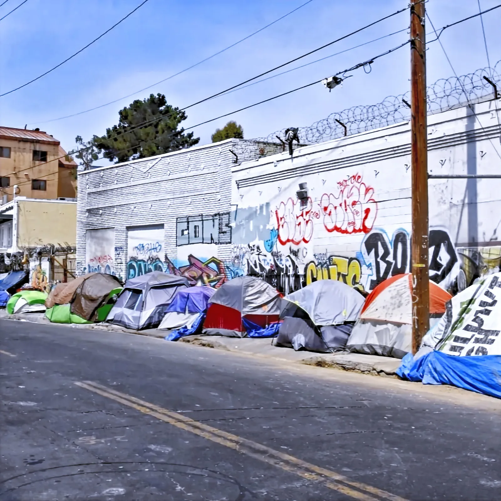 Tents and graffiti along a street in Skid Row, Los Angeles