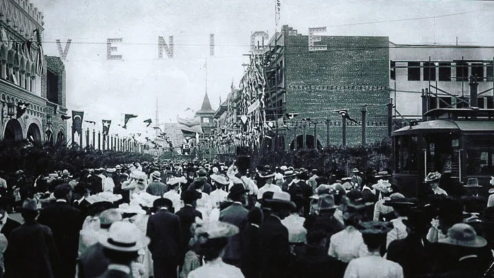 A crowd gathered at the Venice Beach boardwalk