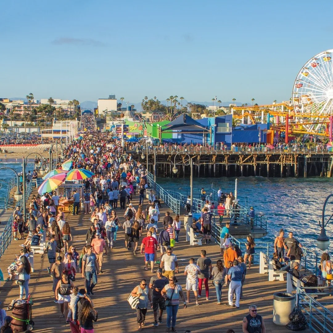 Crowded Santa Monica Pier in Los Angeles County on a sunny day