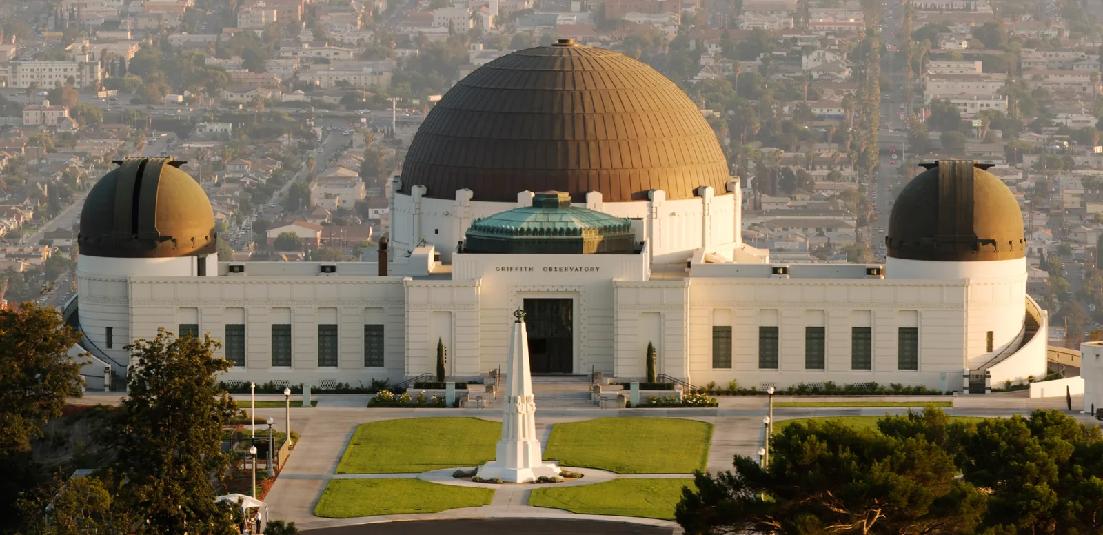 Griffith Observatory's Art Deco building on the Mount Hollywood hilltop above Los Angeles at dusk