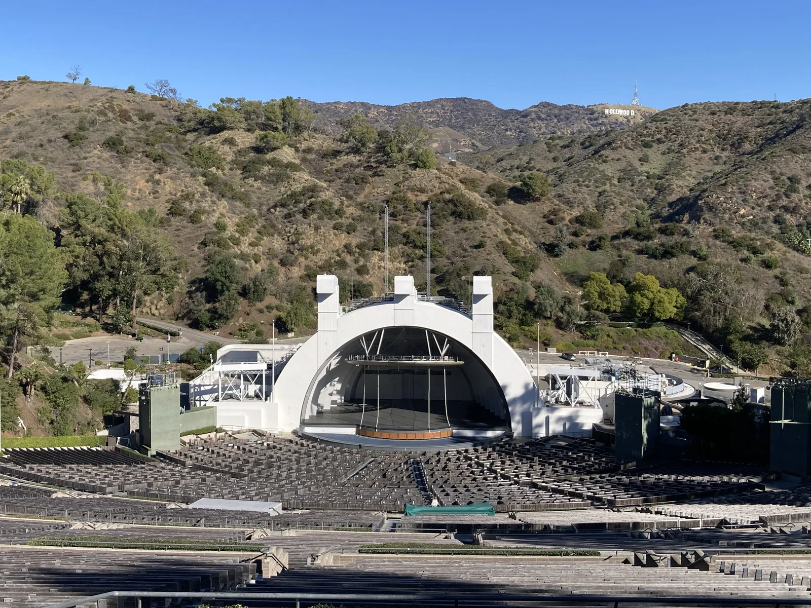The Hollywood Bowl amphitheatre and stage with the Hollywood Sign in the hills behind