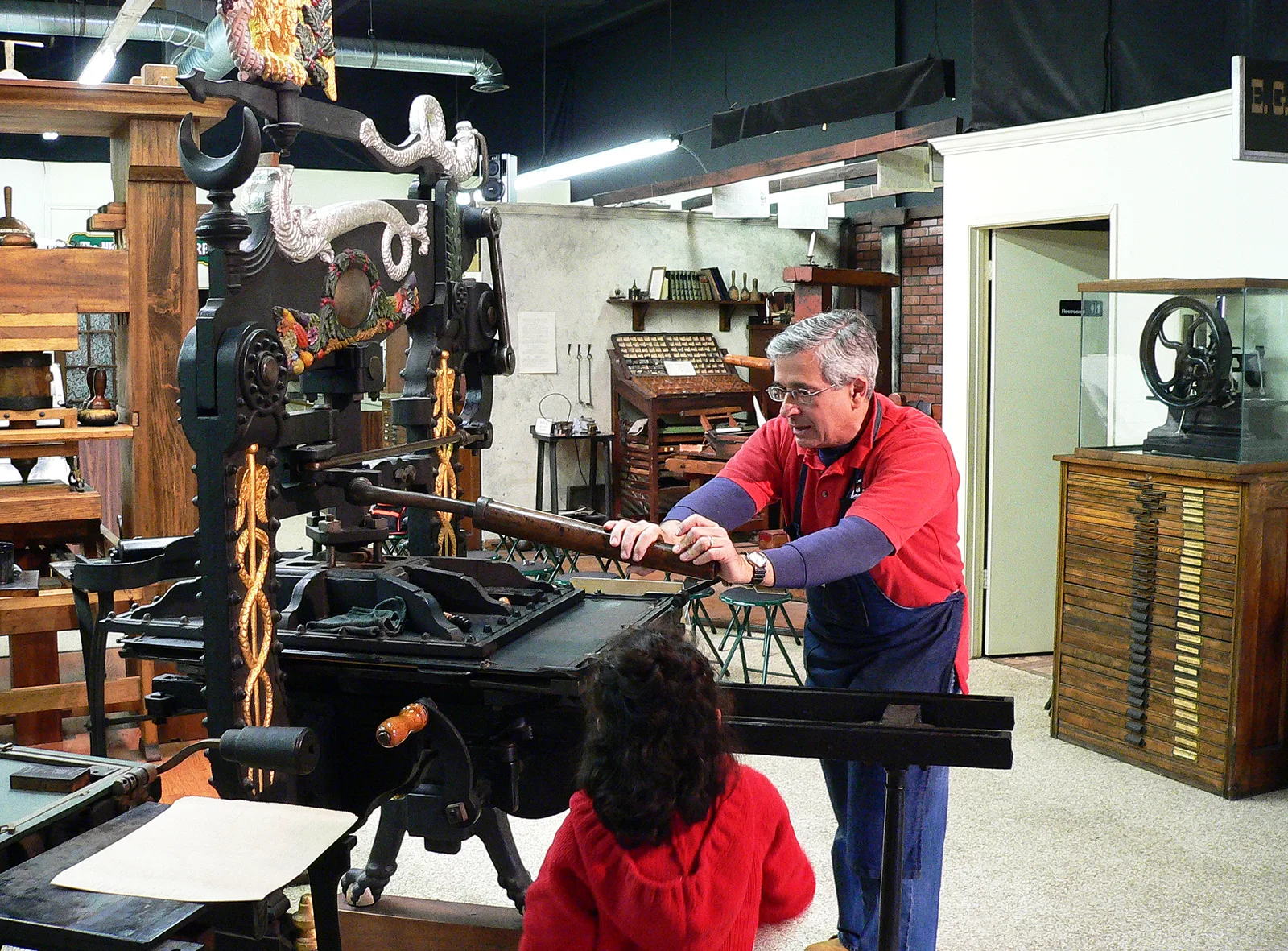 Antique working printing press on display at the International Printing Museum in Carson