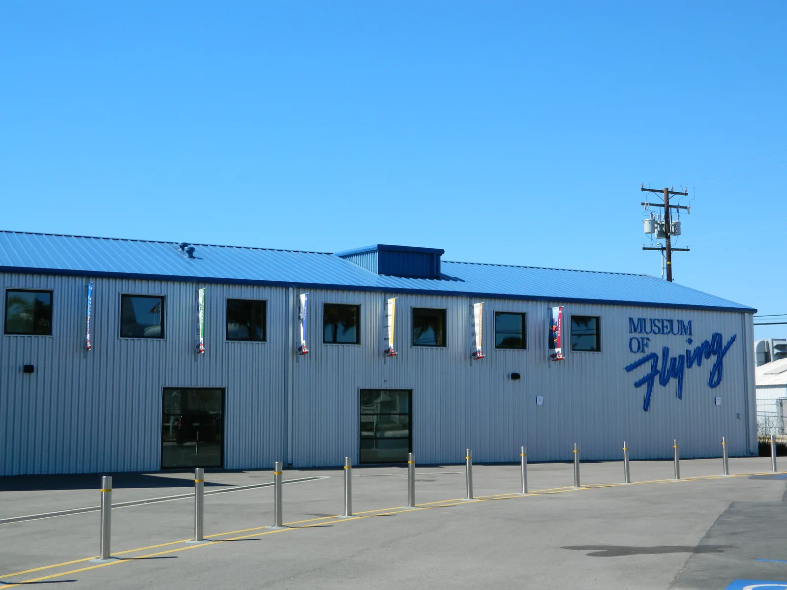 Exterior of the Museum of Flying with signage at Santa Monica Airport