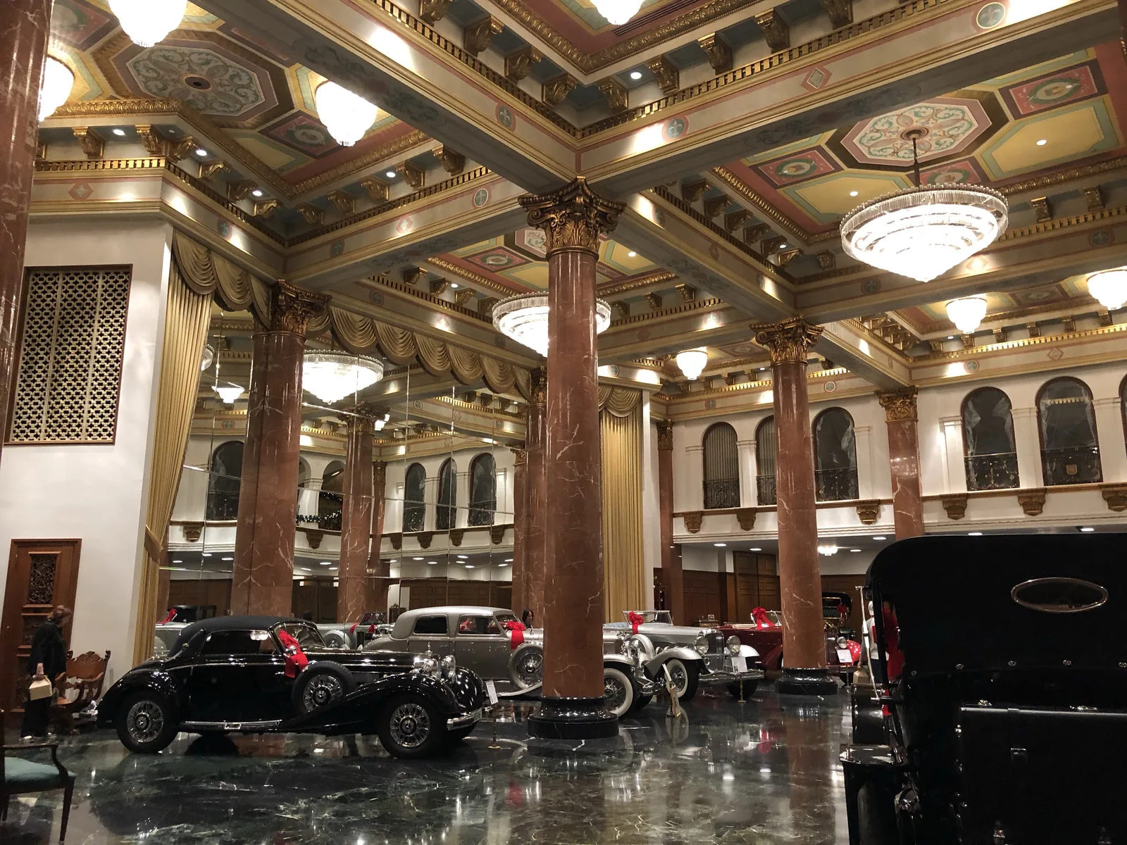 The Grand Salon at the Nethercutt Museum in Sylmar, lined with restored classic automobiles