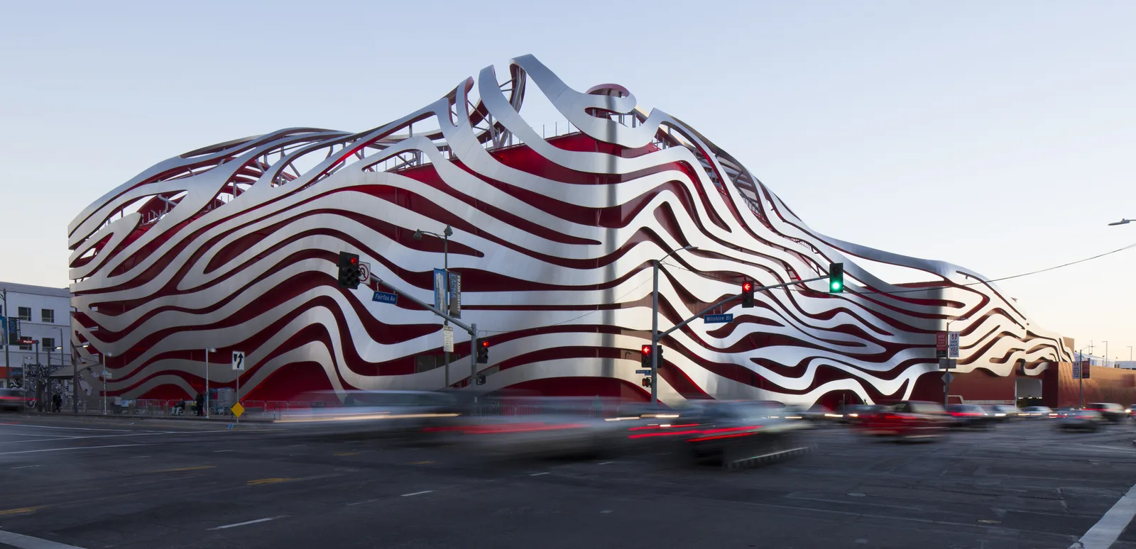 The Petersen Automotive Museum's red-and-steel ribbon façade on Wilshire Boulevard, Los Angeles