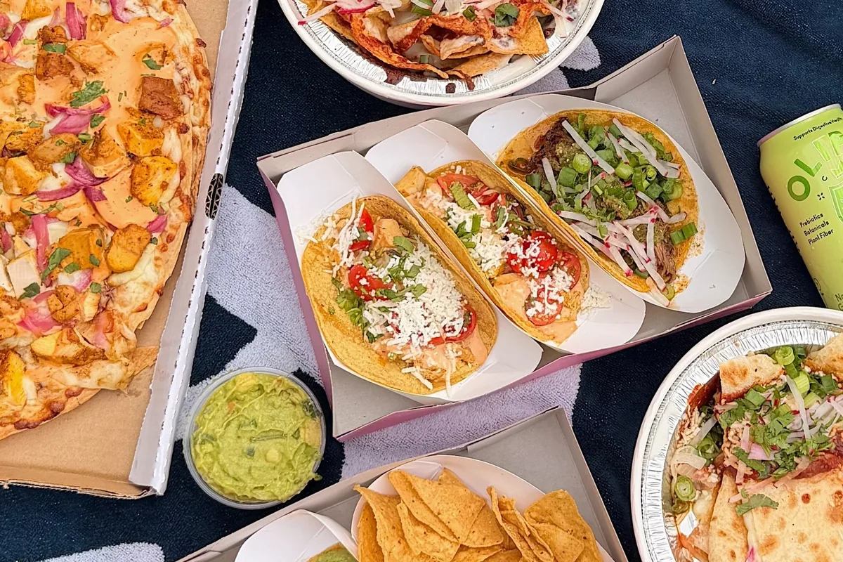 A takeout spread from Chicas Tacos on the beach in Hermosa Beach