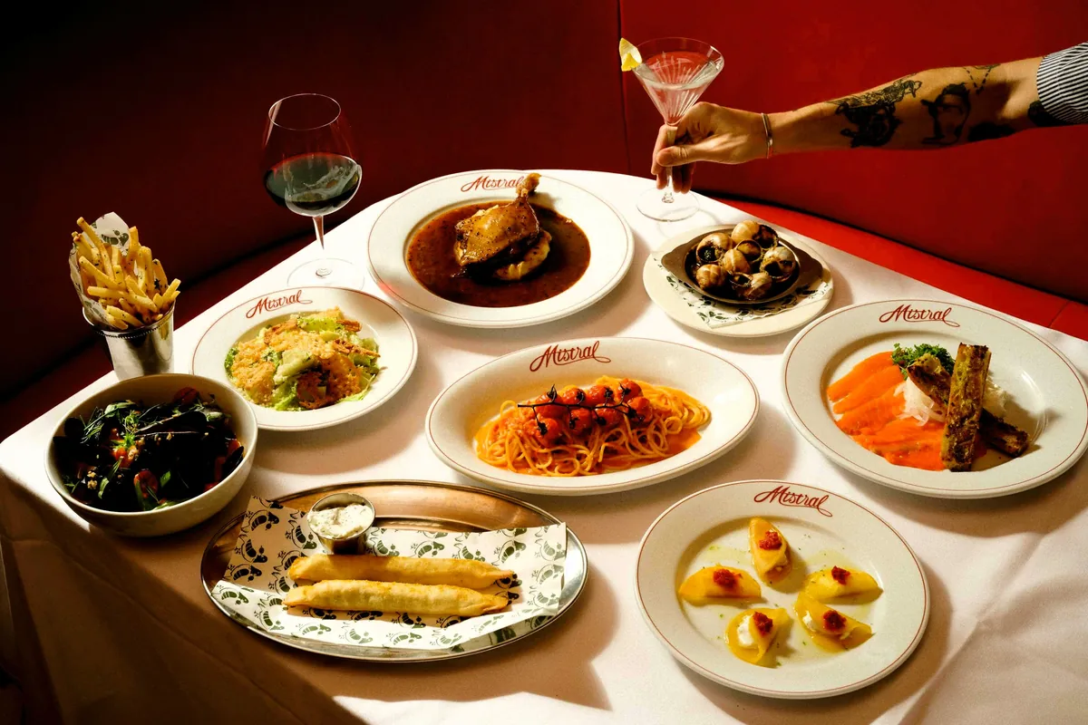 A spread of dishes in the dining room at Mistral in Sherman Oaks