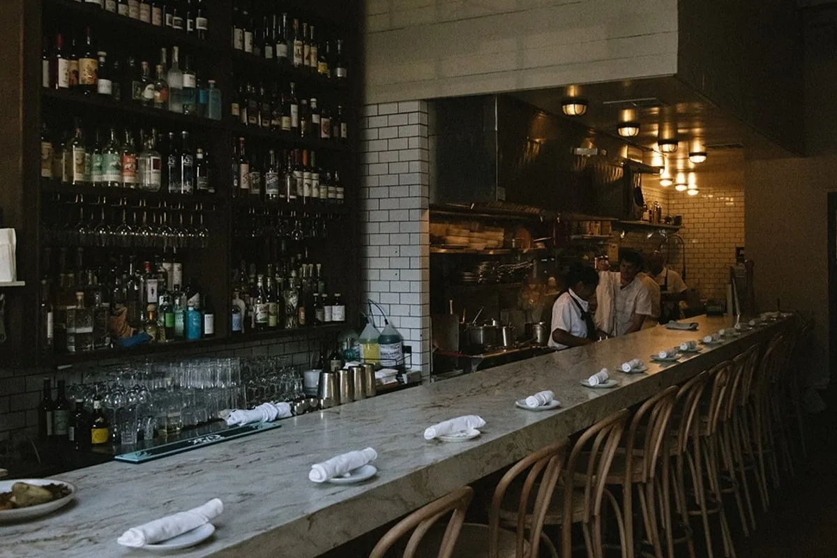 The marble bar and open kitchen at Bar Fortuna on Main Street, Santa Monica