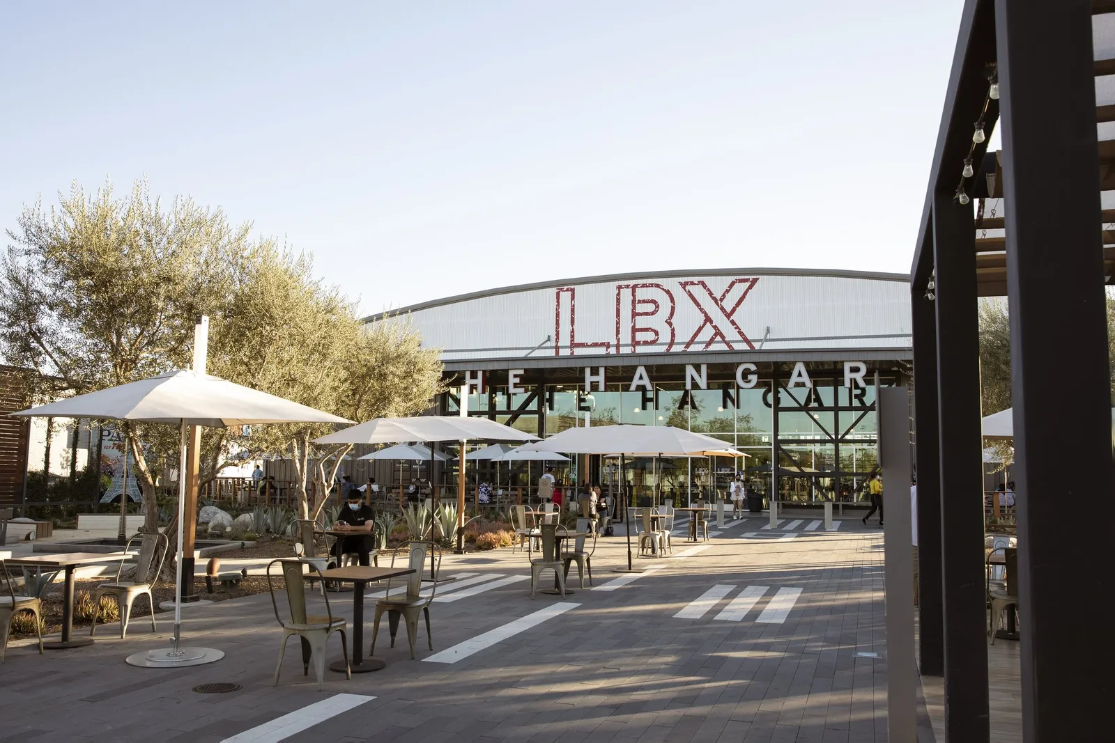 Open-air walkways and storefronts at Long Beach Exchange
