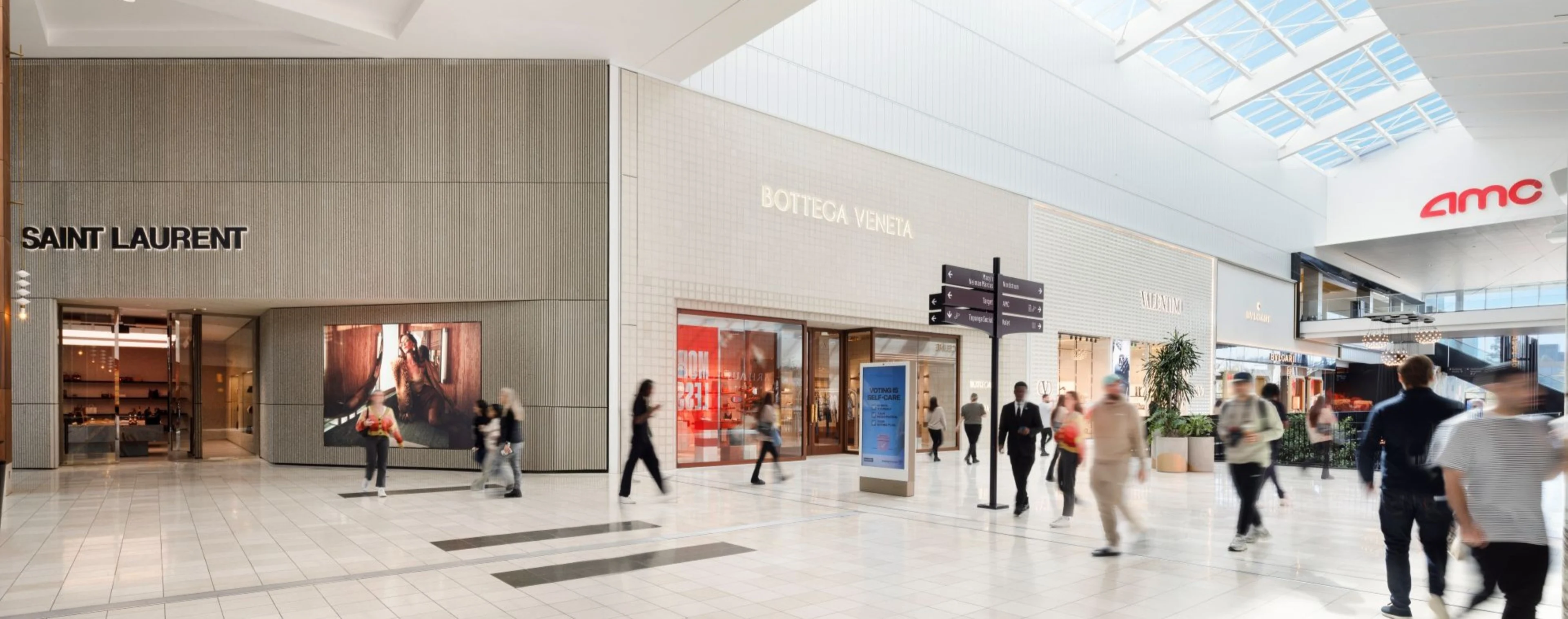 Saint Laurent, Bottega Veneta, and Valentino storefronts inside Westfield Topanga.