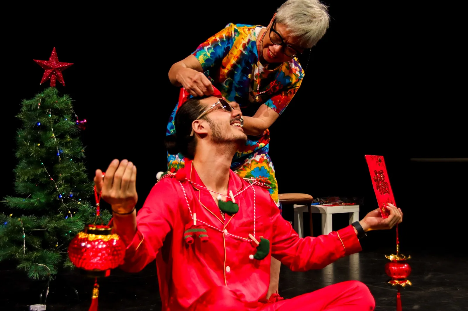 Trent Foo performing in a theater production.