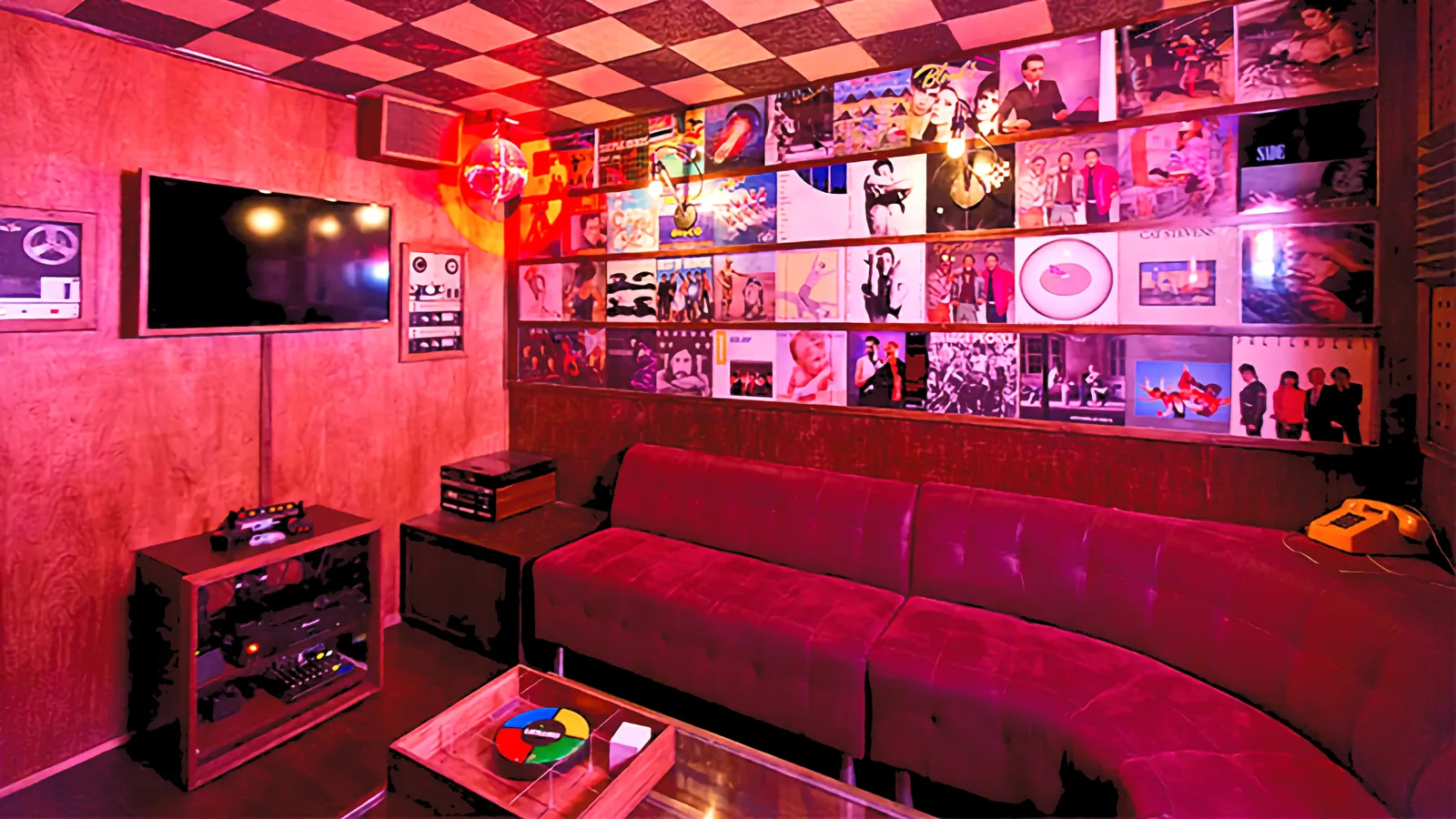 Retro arcade and karaoke room inside Breakroom 86 speakeasy at The Line Hotel in Koreatown