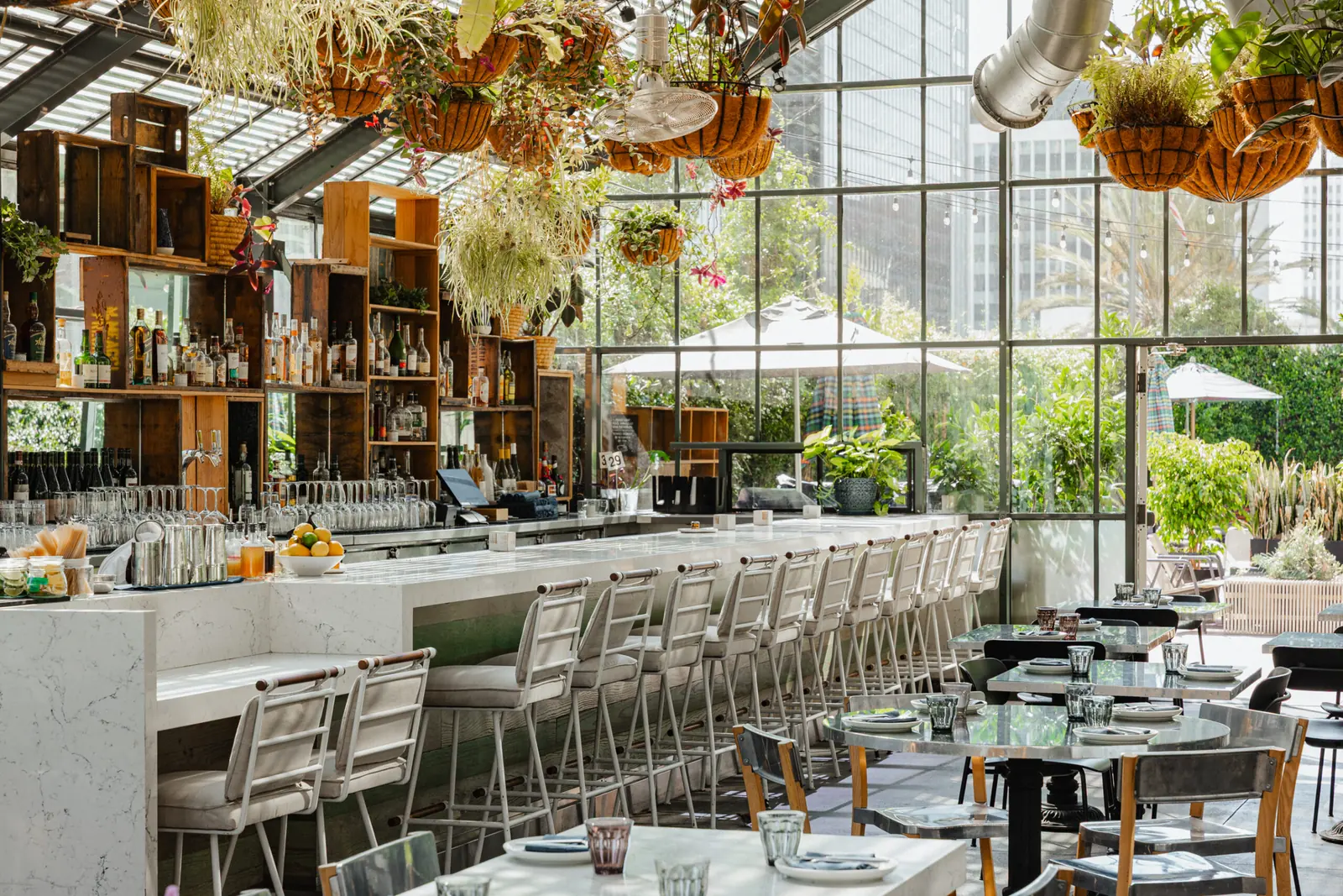 The greenhouse dining room at Openaire in The LINE Hotel in Koreatown