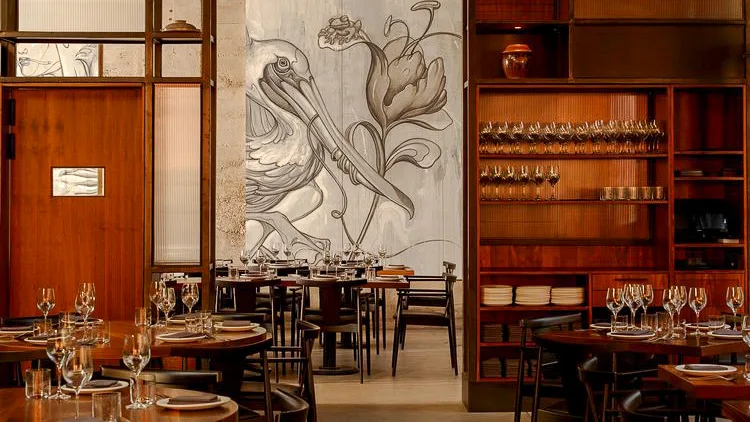 A modern industrial-style dining room at Majordomo