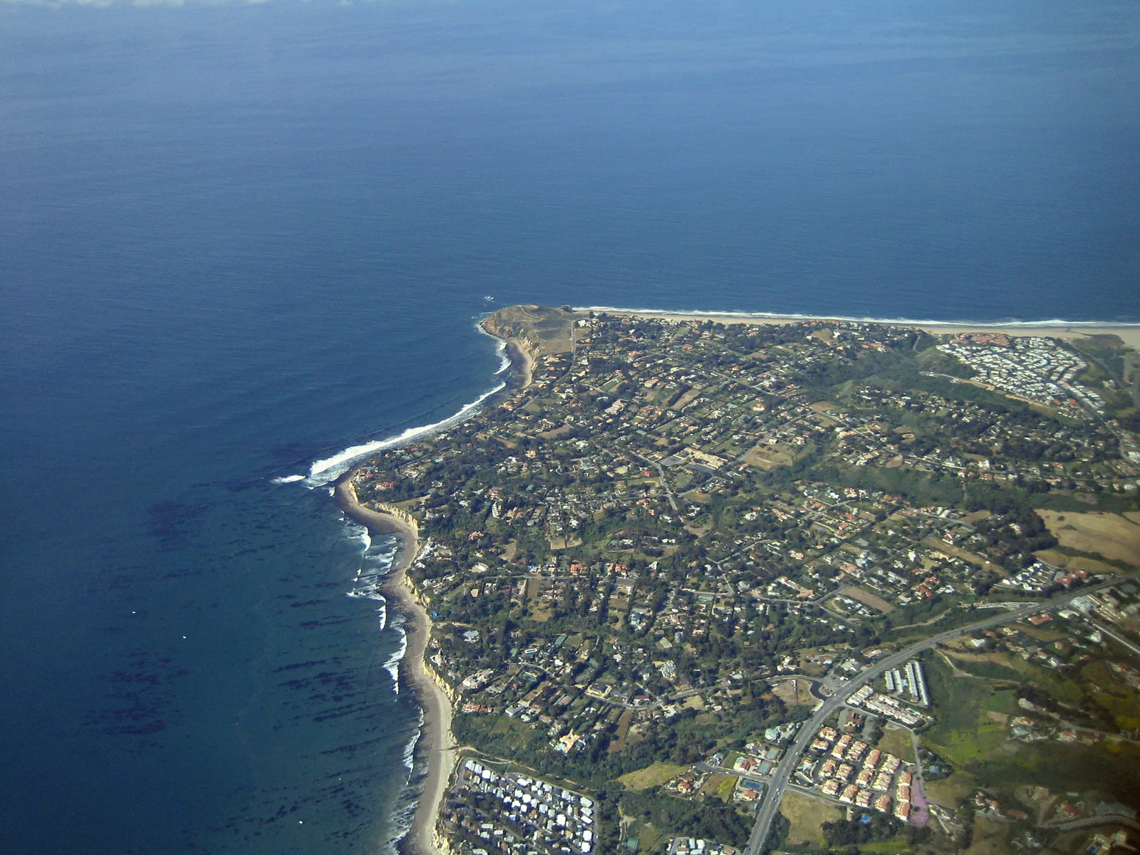 Aerial of the Point Dume headland reaching into the Pacific