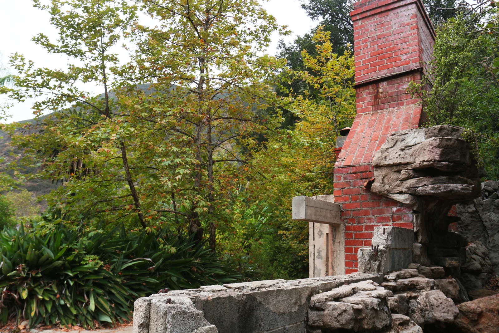 Stone fireplaces and ruins of a canyon home in Solstice Canyon