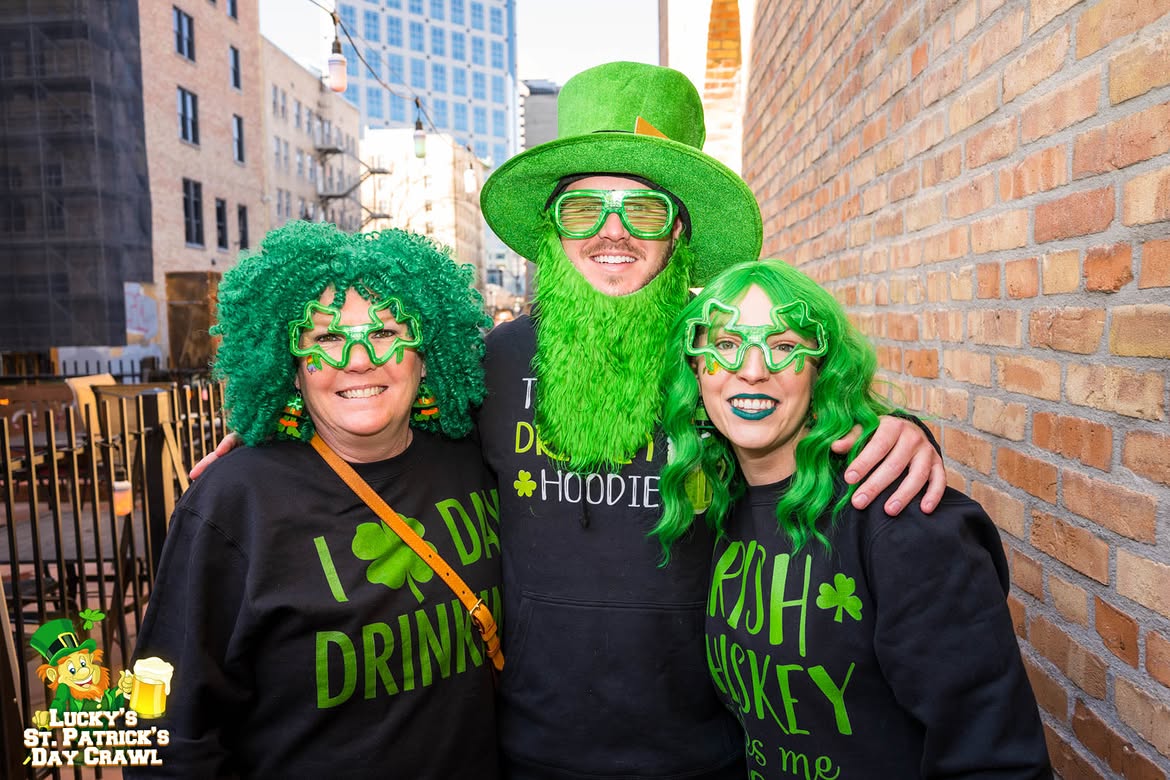 Revelers in green costumes on an LA St. Patrick's bar crawl